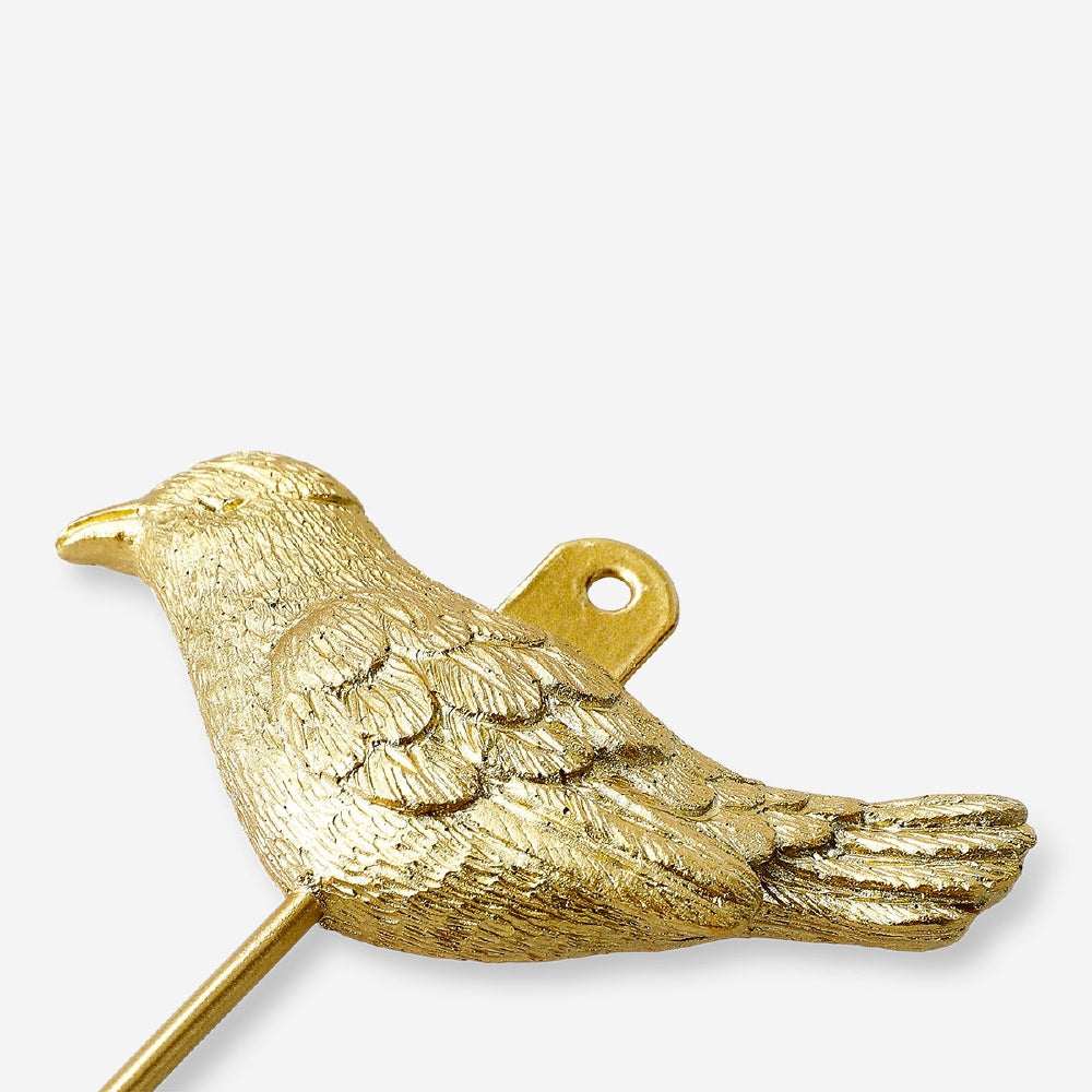 Gold bird hook for home decor by Flying Tiger Copenhagen, featuring a decorative bird design for wall hanging.