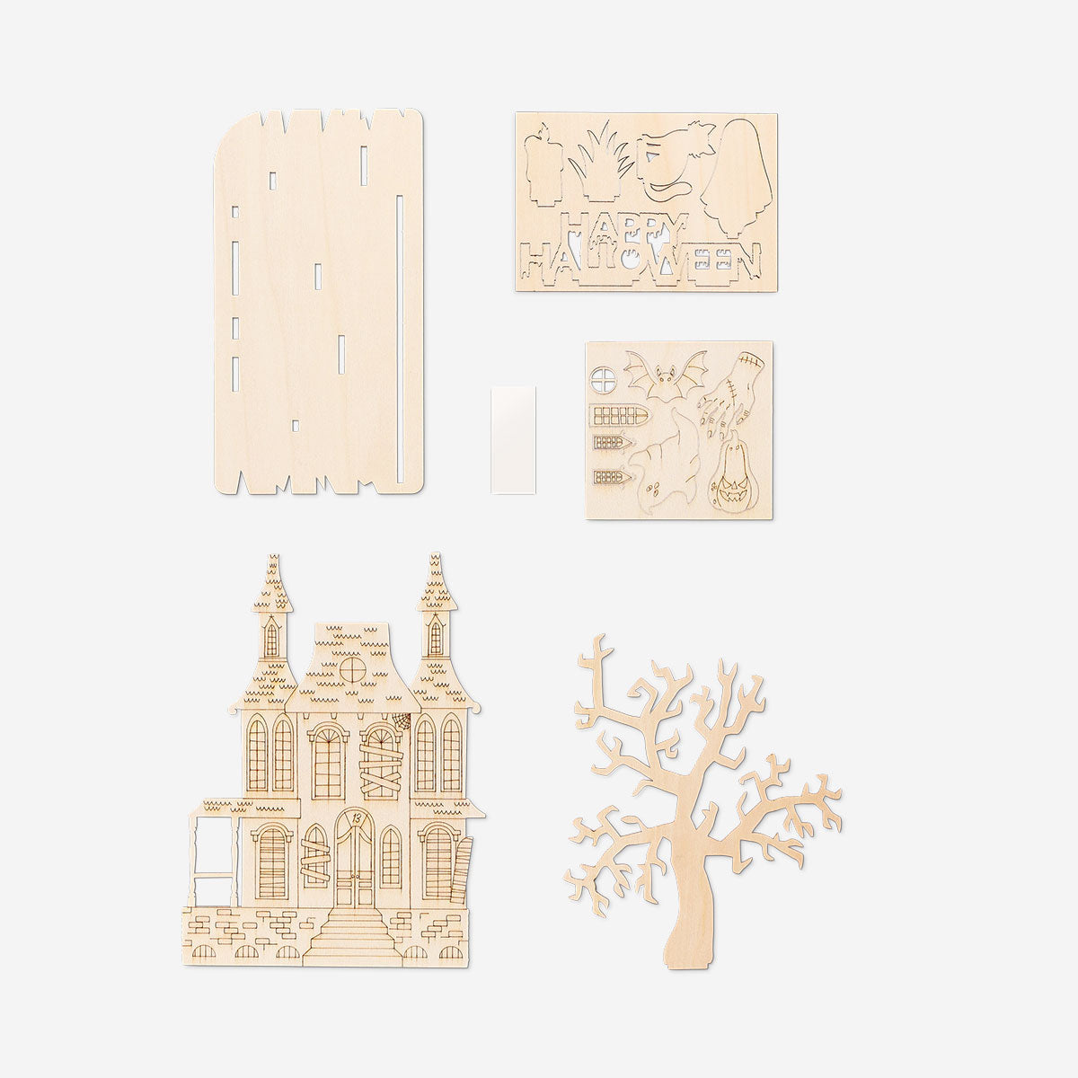 DIY haunted house craft kit with paint and brush by Flying Tiger Copenhagen, ideal for hobby projects and creative Halloween decorating.