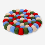 Colorful wool trivet in mixed colors, 10 cm, from Flying Tiger Copenhagen, designed for kitchen use and heat protection.