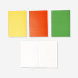 Set of four Flying Tiger Copenhagen A5 lined notebooks for office or note-taking with colorful covers.