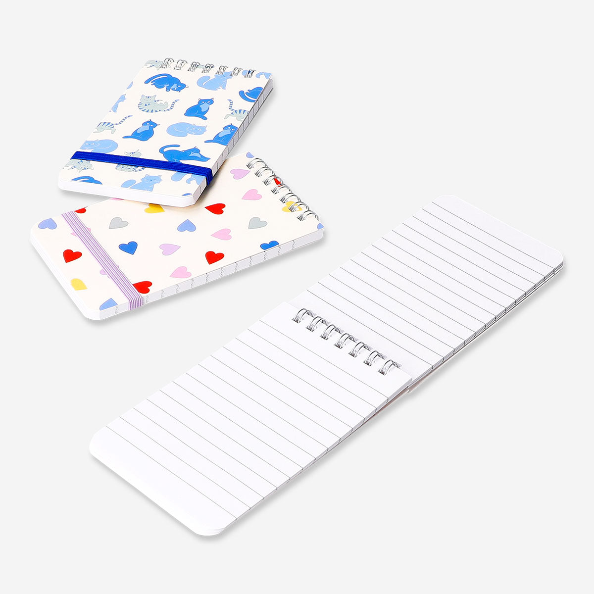Set of three spiralbound office notepads with cute cat print designs by Flying Tiger Copenhagen.