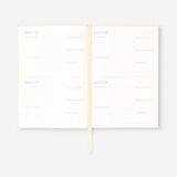 Flying Tiger Copenhagen self-care journal for office use, featuring a clean design and space for notes and wellness tracking.