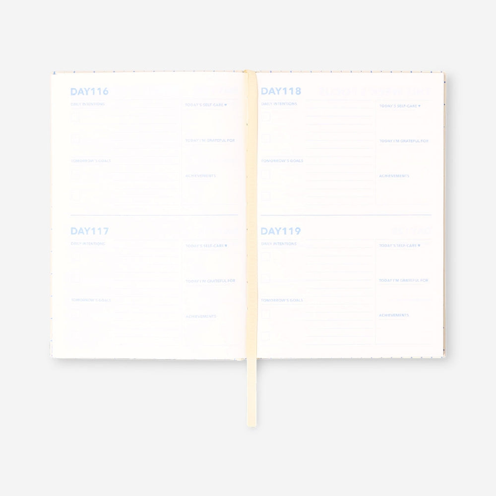 Flying Tiger Copenhagen self-care journal for office use, featuring a clean design and space for notes and wellness tracking.