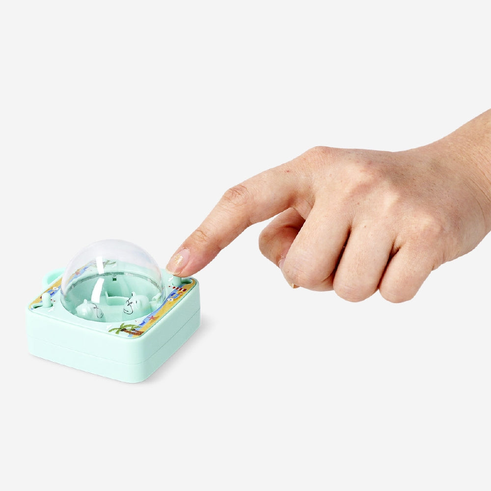 Mini eating game by Flying Tiger Copenhagen, featuring colorful game pieces and a playful setup for fun, fast-paced eating challenges.