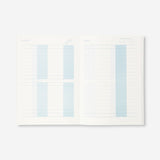 A5 English budget planner from Flying Tiger Copenhagen, featuring colorful pages and pocket-sized office organization design.