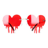 Red drip hearts party glasses by Flying Tiger Copenhagen with heart-shaped design for festive celebrations.