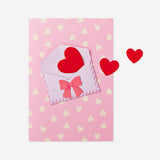 Pink greetings card with mini envelope