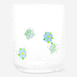 Blue embossed flower drinking glass, 340 ml, made of glass, in a kitchen setting, by Flying Tiger Copenhagen.