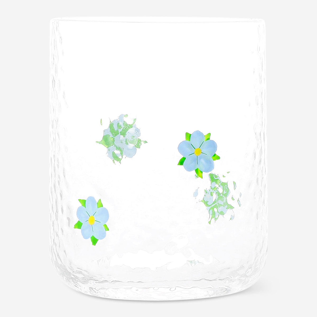 Blue embossed flower drinking glass, 340 ml, made of glass, in a kitchen setting, by Flying Tiger Copenhagen.