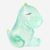 Green Flying Tiger Copenhagen fidget dinosaur gadget with movable limbs and textured surface for tactile sensory play.