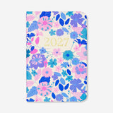 Flying Tiger Copenhagen floral weekly diary 2027 for office use, featuring colorful floral cover design and weekly planner pages.