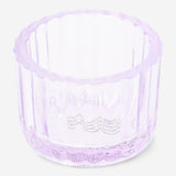 Purple glass tealight holder for home decor by Flying Tiger Copenhagen, featuring a smooth, rounded design and transparent finish.