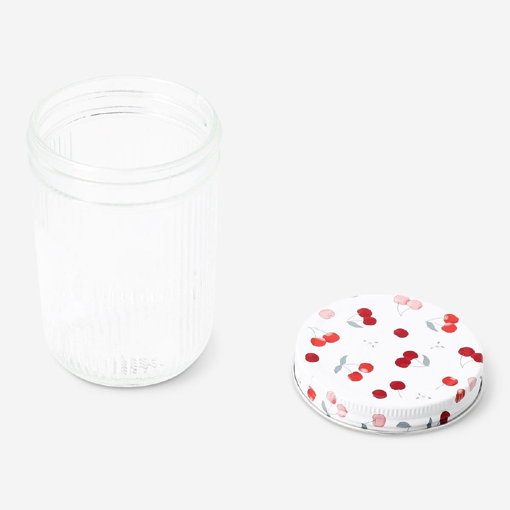 Glass storage jar with cherry print lid, 13 cm, ideal for kitchen organization, by Flying Tiger Copenhagen.