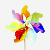 Colorful rainbow pinwheel toy measuring 57x24 cm, with vibrant blades spinning in the wind. Flying Tiger Copenhagen brand.