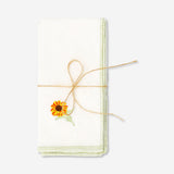 Set of two fabric napkins with embroidered sunflower designs, perfect for home décor and table settings.