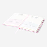 Flying Tiger Copenhagen gratitude journal for office use, featuring a compact design and motivational pages for daily reflection.