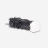 Textile keyring featuring a fox tail design from Flying Tiger Copenhagen, with a colorful, soft fabric appearance.