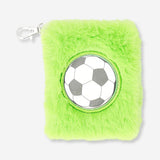 Office notebook with football motif and keyring by Flying Tiger Copenhagen, featuring a football-themed cover and attached keyring.