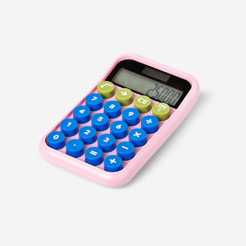 Pink solar-powered office calculator by Flying Tiger Copenhagen with digital display and functional keys.