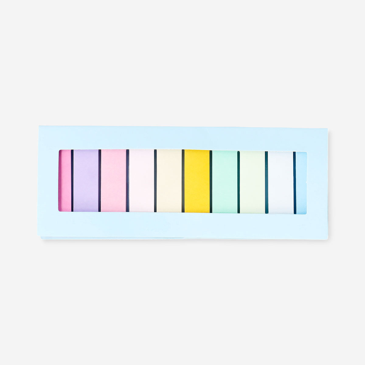 Multi-colored office page markers from Flying Tiger Copenhagen, spread out on a desk, showing vibrant, reusable bookmark strips.