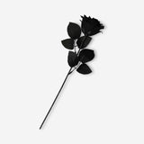 Black decorative flower resembling a rose, ideal for home decor, by Flying Tiger Copenhagen.