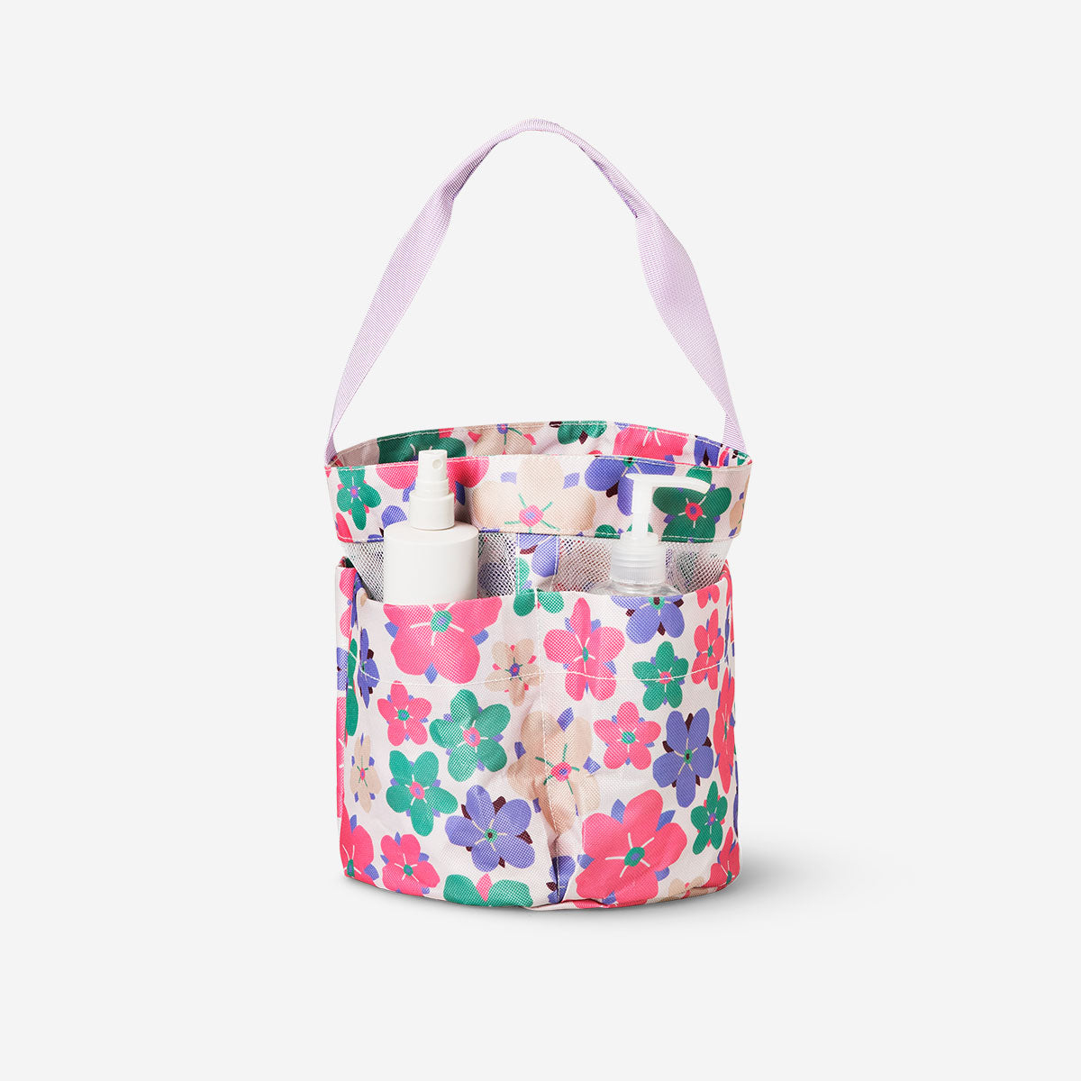 Flying Tiger Copenhagen floral hanging bathroom organiser with multiple pockets for storage and decorative floral design.