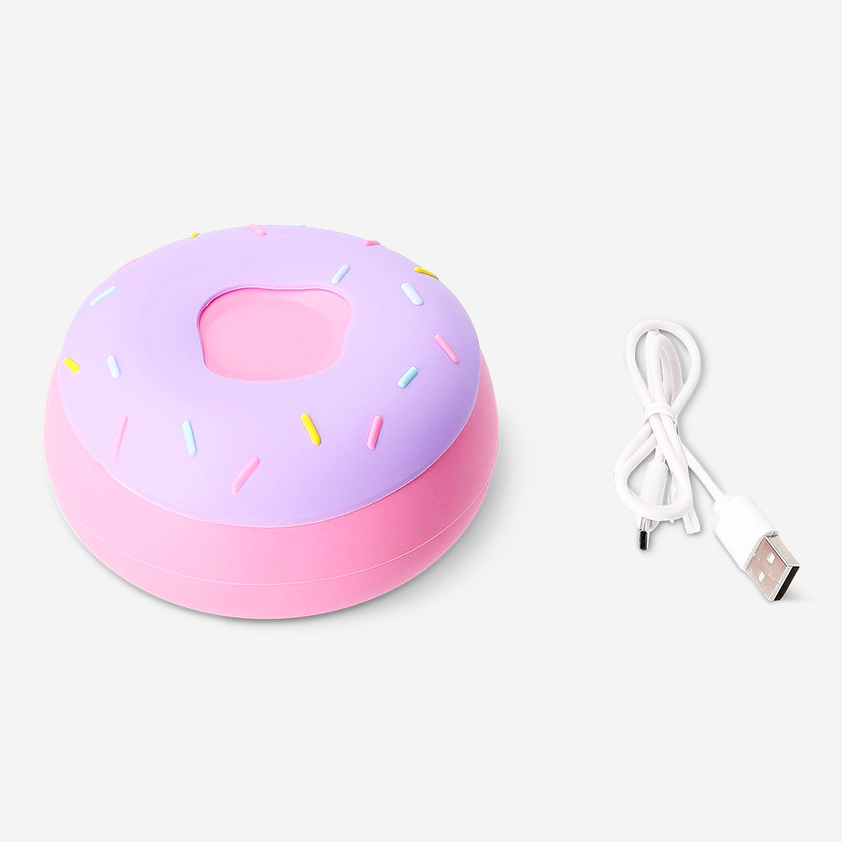 Pink doughnut-shaped gadget lamp from Flying Tiger Copenhagen, cozy and fun decor item with soft lighting.