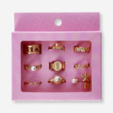 Set of nine adjustable textile rings featuring sea icons from Flying Tiger Copenhagen, displayed on a neutral background.