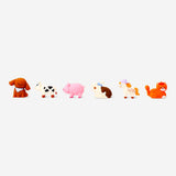Colorful Flying Tiger Copenhagen collectible surprise toy featuring various pet-themed figures in bright, playful designs.