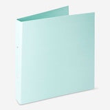 Green office ring binder by Flying Tiger Copenhagen, with metal rings and a durable spine for organizing documents.
