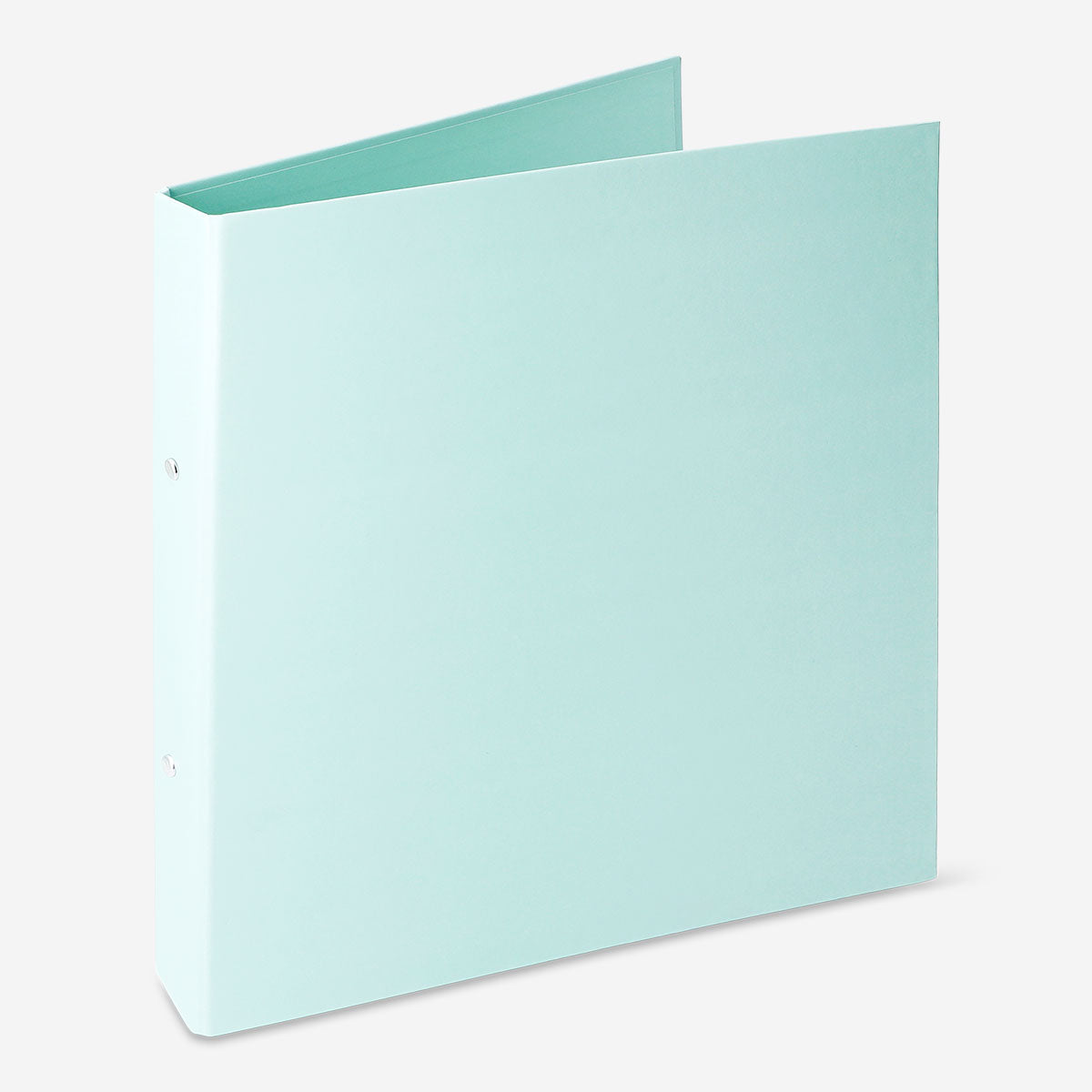 Green office ring binder by Flying Tiger Copenhagen, with metal rings and a durable spine for organizing documents.