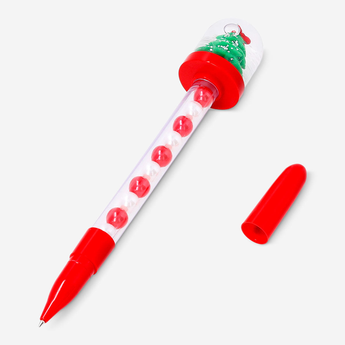 Flying Tiger Copenhagen Christmas tree snowglobe ballpoint pen, festive office accessory with holiday-themed design.