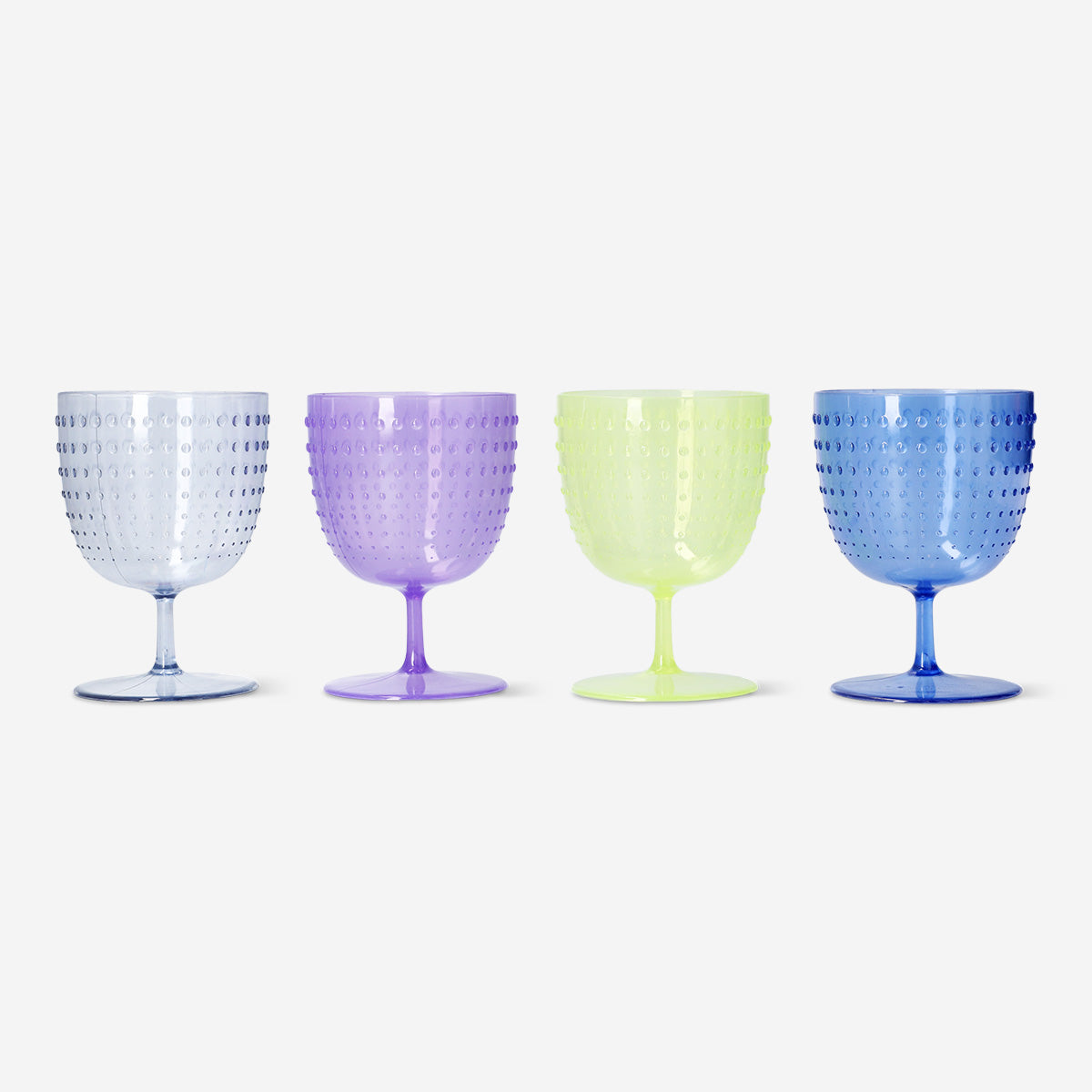 Set of four pearlescent wine glasses with dotted design, perfect for parties, by Flying Tiger Copenhagen.