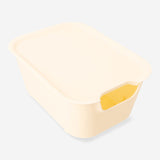 Yellow storage box with lid, 19x26 cm, from Flying Tiger Copenhagen, ideal for organizing home essentials.