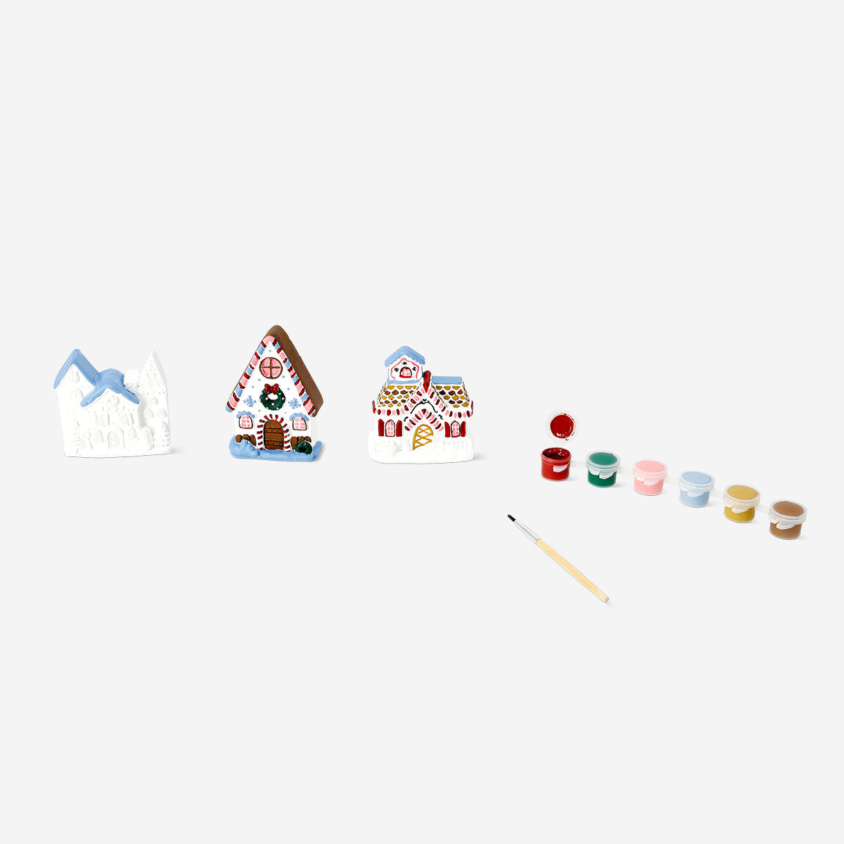 DIY plaster Christmas houses hobby kit by Flying Tiger Copenhagen, featuring unpainted festive house models for holiday crafting.