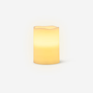 White LED pillar candle from Flying Tiger Copenhagen, 10 cm tall, ideal for home décor and ambient lighting.