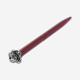 Flying Tiger Copenhagen metal rose ballpoint pen for office use with a sleek, metallic rose design on the pen body.