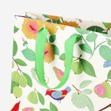 Tropical print gift bag from Flying Tiger Copenhagen, 25x33 cm, designed for office gifting or decor.