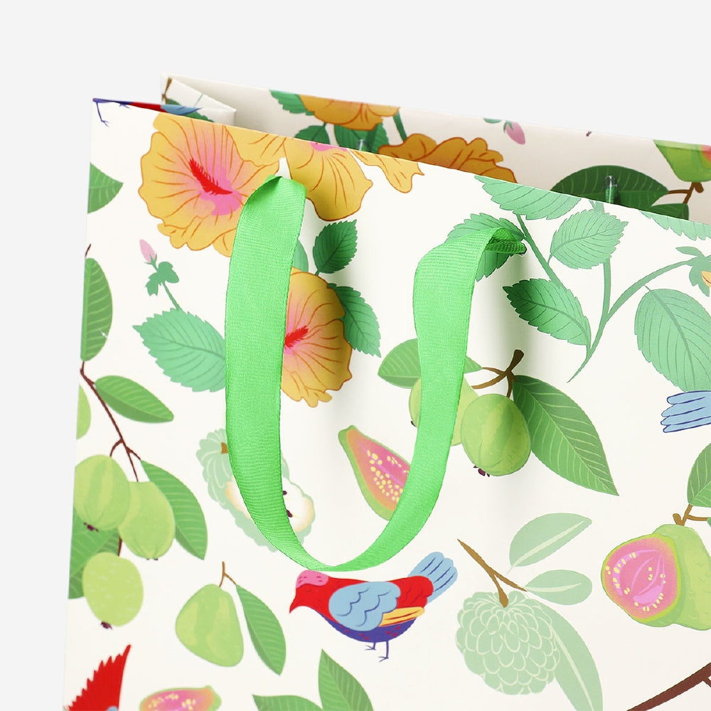 Tropical print gift bag from Flying Tiger Copenhagen, 25x33 cm, designed for office gifting or decor.