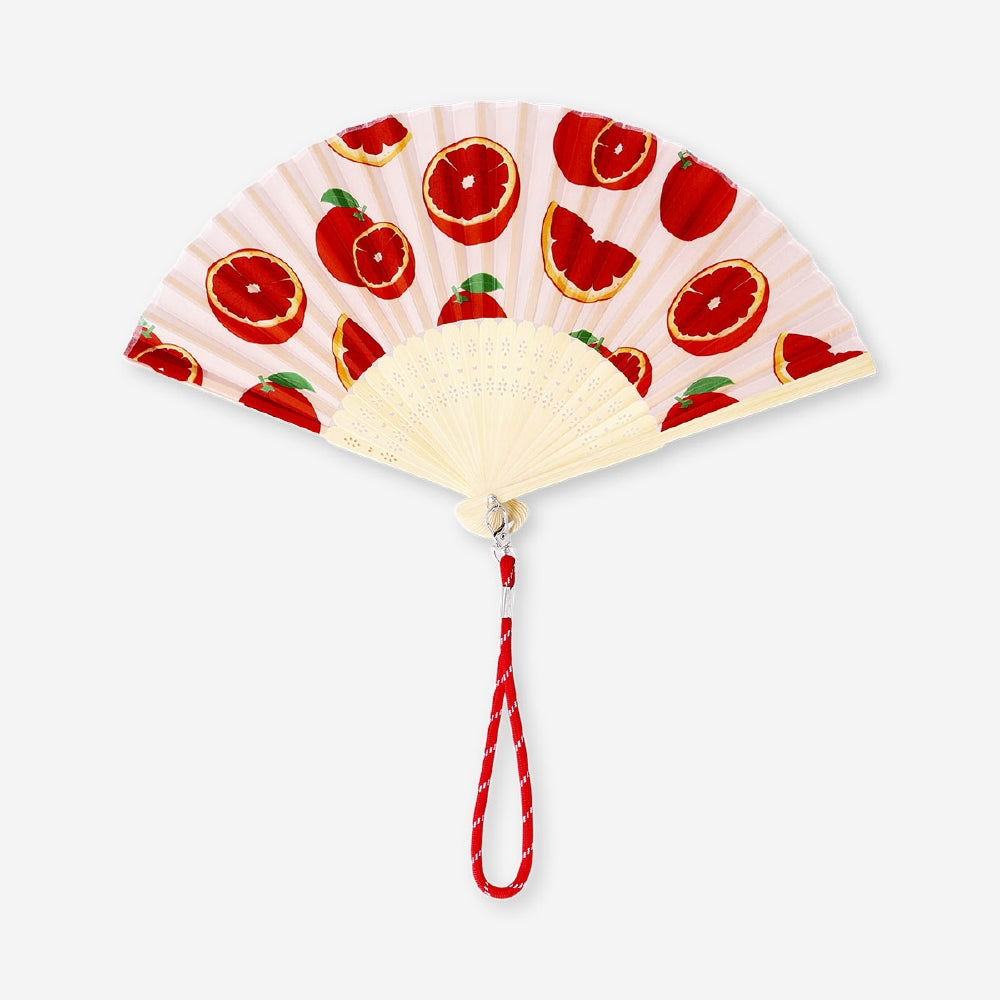 Foldable bamboo textile fan with blood orange print and strap, lightweight and portable by Flying Tiger Copenhagen.