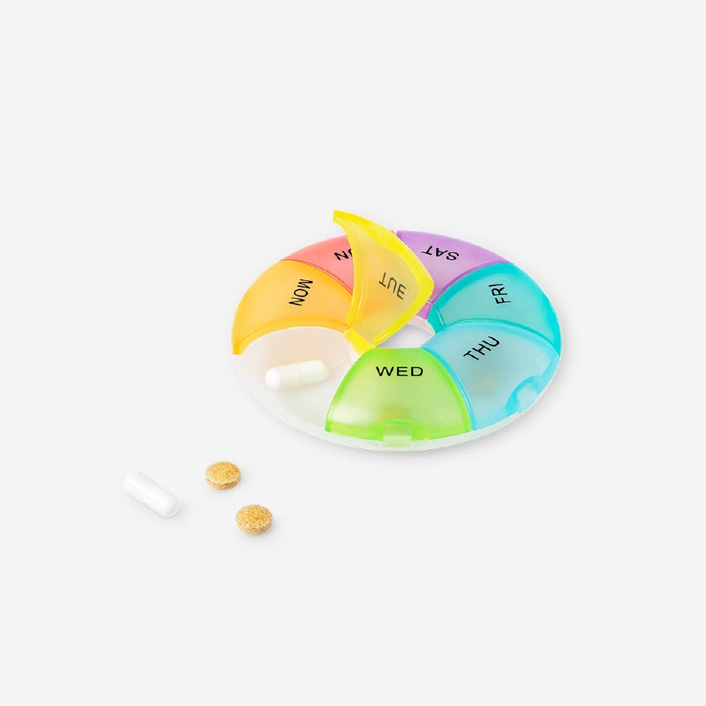 Rainbow pill organizer for weekly leisure use by Flying Tiger Copenhagen, with colorful compartments for daily medication.