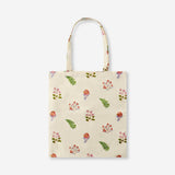 Flying Tiger Copenhagen floral print tote bag made of textile, featuring colorful flower patterns and sturdy handles.