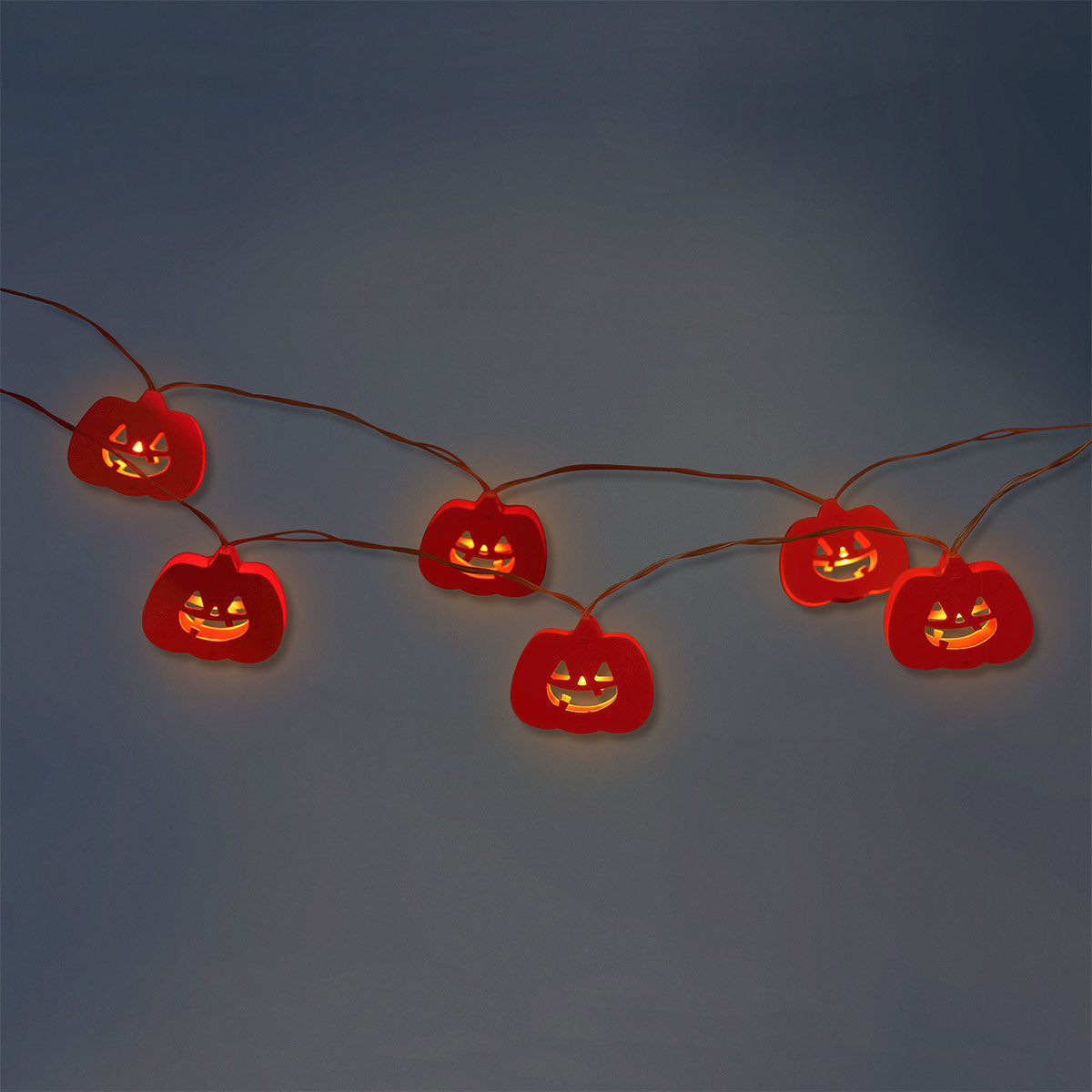 Flying Tiger Copenhagen Halloween pumpkin string lights for home decor, featuring festive orange pumpkin-shaped bulbs.
