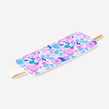 Flying Tiger Copenhagen floral office pen holder with a strap for books, featuring colorful floral patterns and a functional design.