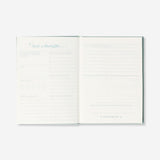 Flying Tiger Copenhagen Bedtime Journal in English, styled for office use with a clean cover design and lined pages for writing.