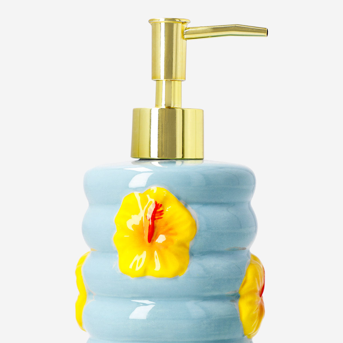 Ceramic soap dispenser with hibiscus flower print, designed for home use, by Flying Tiger Copenhagen.
