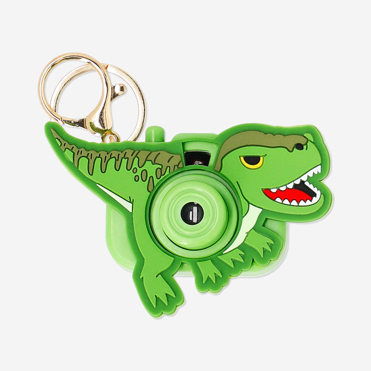 Flying Tiger Copenhagen dinosaur projector camera gadget with green dinosaur design, showcasing a playful, compact device for kids.