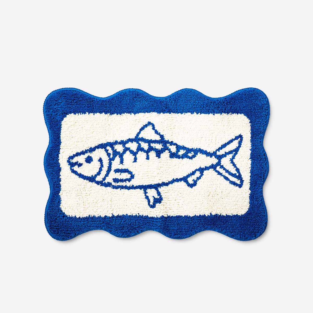 Bath mat with colorful fish motif, 40x60 cm, from Flying Tiger Copenhagen, featuring a soft, textured surface and vibrant aquatic design.
