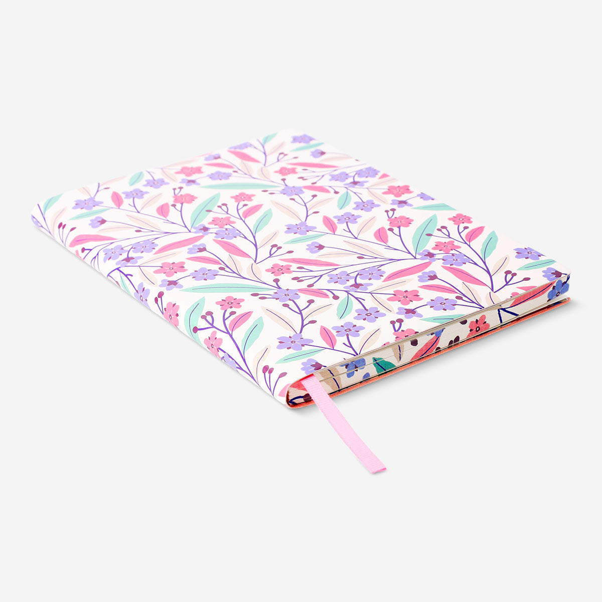 A5 soft cover floral notebook by Flying Tiger Copenhagen with colorful flower patterns on the cover.