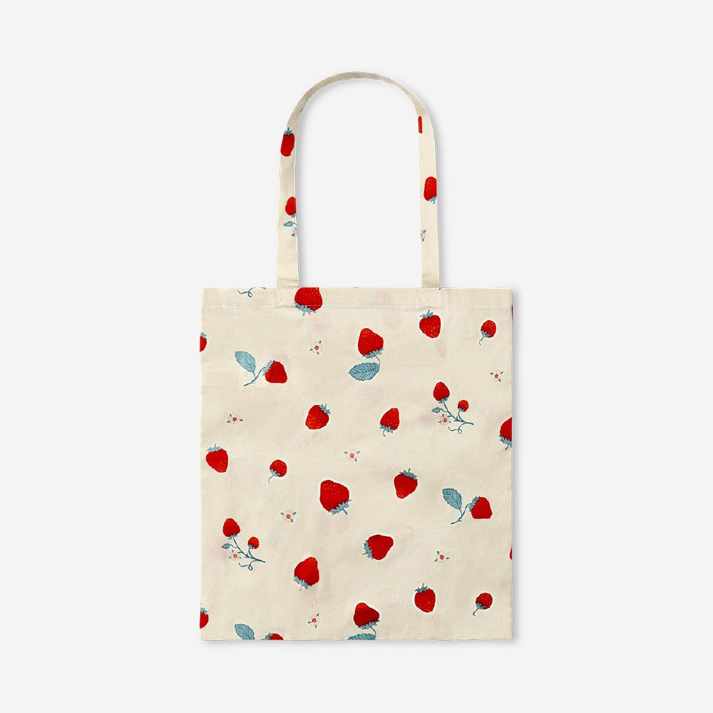Strawberry print textile tote bag by Flying Tiger Copenhagen showing colorful fruit design and sturdy handles.